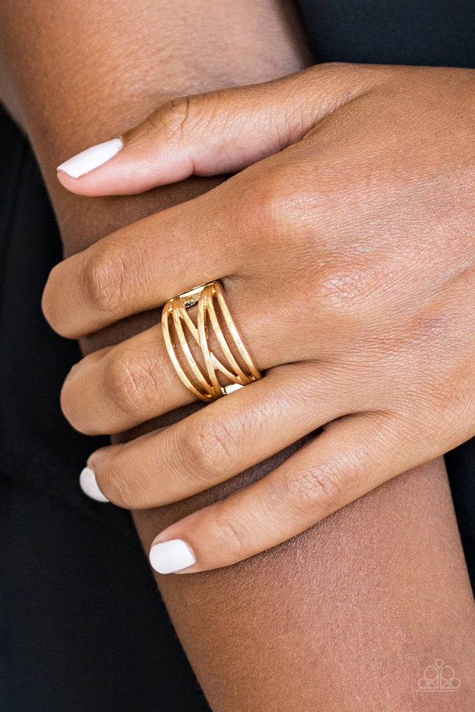 Glistening gold bars arc and crisscross across the finger, creating an edgy layered band. Features a stretchy band for a flexible fit.  Sold as one individual ring.