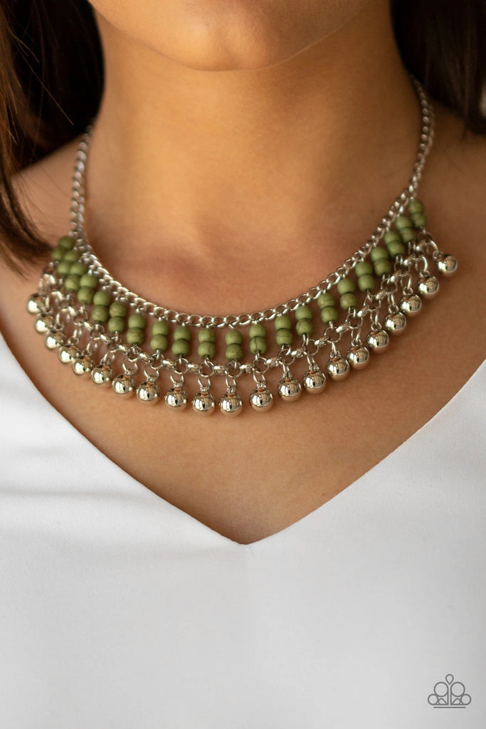 Threaded along dainty silver rods, stacks of green stone beads give way to a row of shiny silver beads, creating an earthy fringe below the collar. Features an adjustable clasp closure.  Sold as one individual necklace. Includes one pair of matching earrings.
