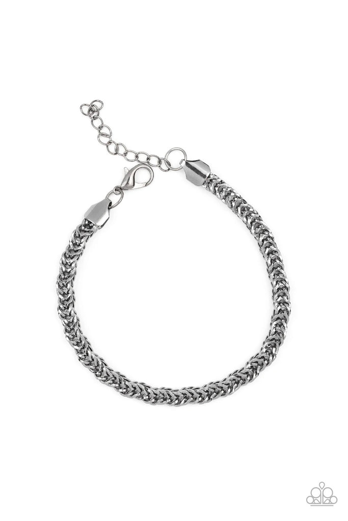 Brushed in a high-sheen finish, an ornate gunmetal chain links around the wrist for a bold look. Features an adjustable clasp closure.  Sold as one individual bracelet.